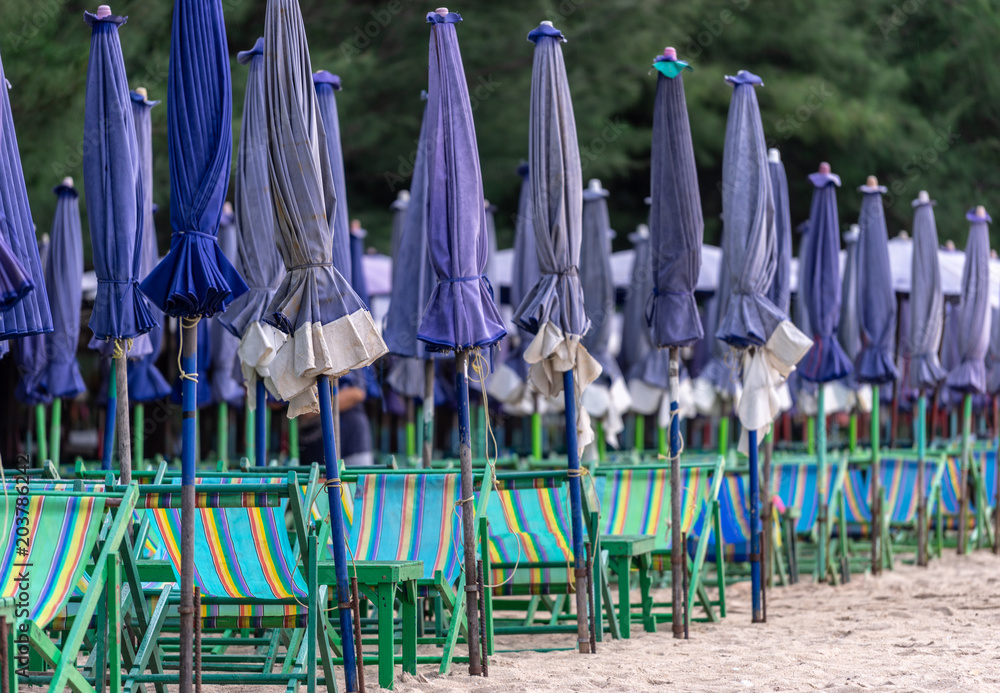 Umbrellas and beach chairs Empty tourist in low season