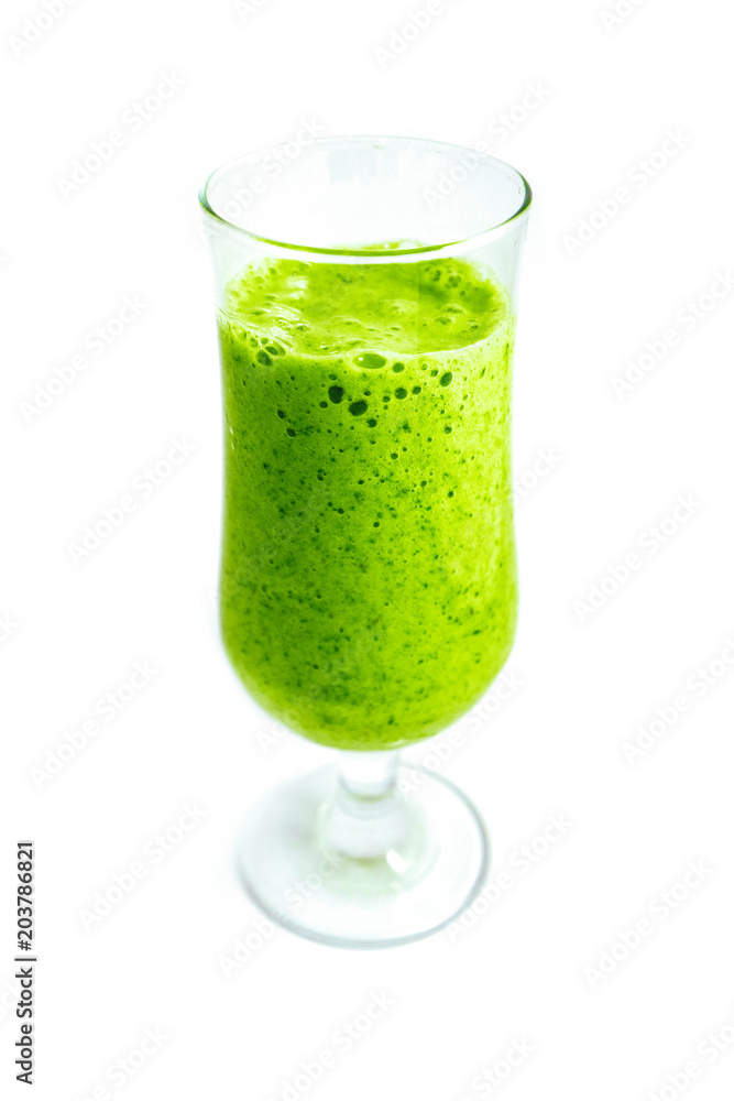 A glass of green organic smoothie drink, isolated on a white background. Healthy diet concept. A glass of green organic smoothie drink, isolated on a white background. Healthy diet concept.