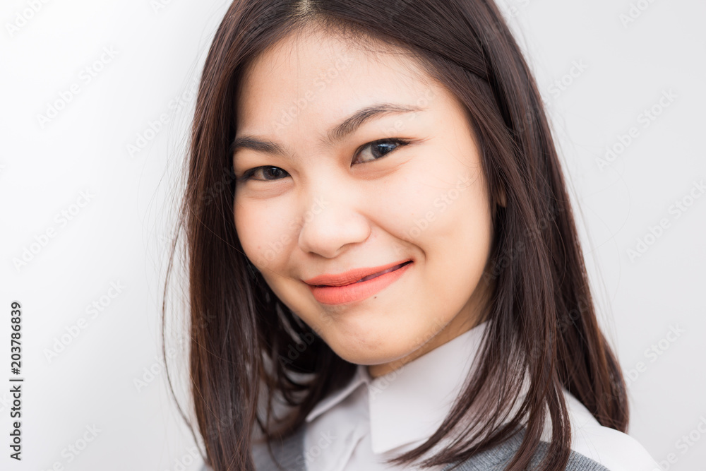 Beautiful young asian women smiling on white background Beautiful young asian women smiling on white background
