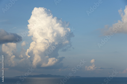 Cumulus clouds and blue sea in the morning