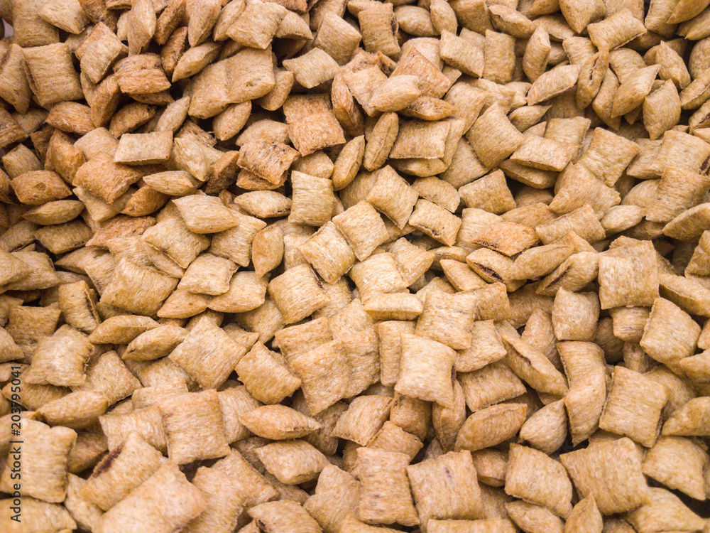 Corn-flakes background and texture, cornflake cereal box for morning breakfast. Corn-flakes background and texture, cornflake cereal box for morning breakfast.