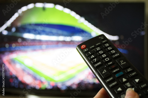 Football match and remote control photo