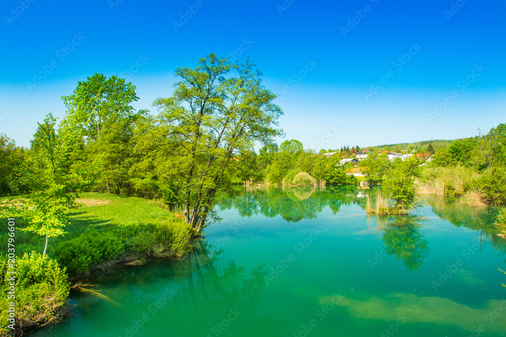      Beautiful village of Belavici on the bank of Mreznica river, countryside landscape, Croatia 