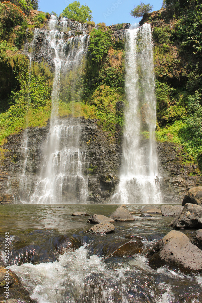 Naklejka premium Tad Yuang Waterfalls on the Bolaven Plateau in Laos. Wild nature landscape