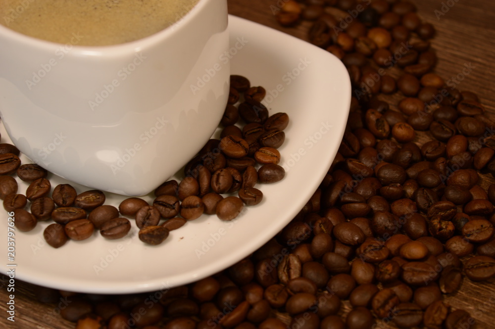 Obraz premium a cup of coffee on a saucer