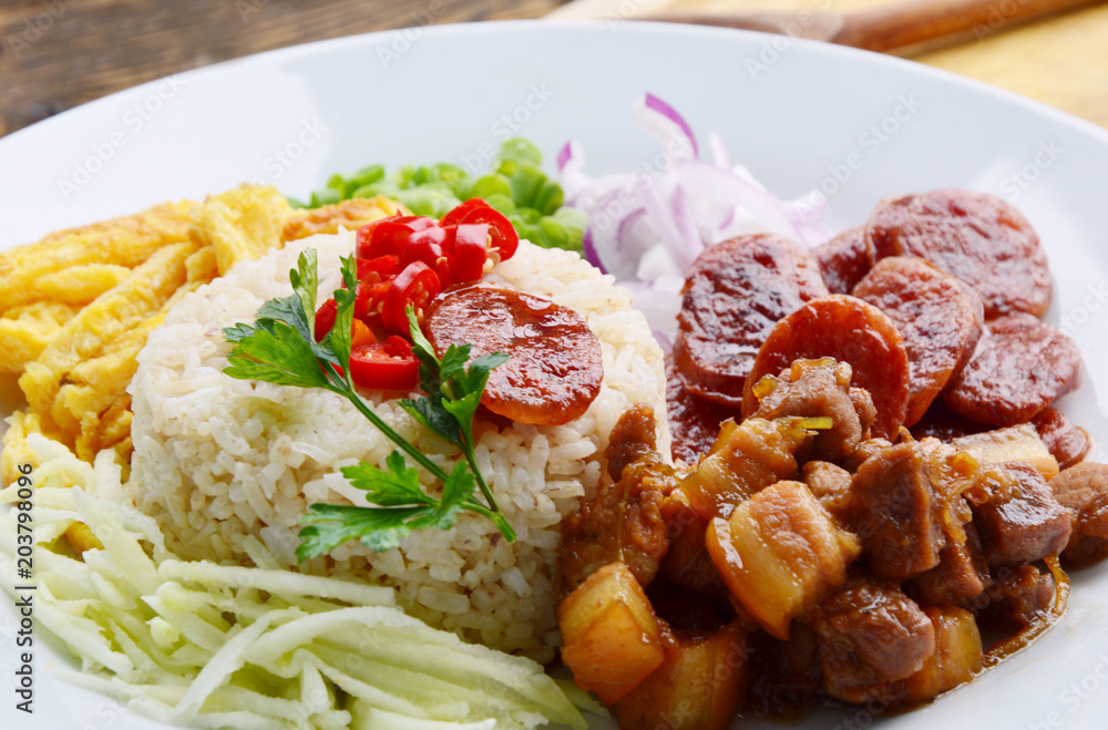 Rice Seasoned with Shrimp Paste (Thai name is khaao khlook gabpi).
Thai food master Rice menu. Rice Seasoned with Shrimp Paste (Thai name is khaao khlook gabpi).
Thai food master Rice menu.