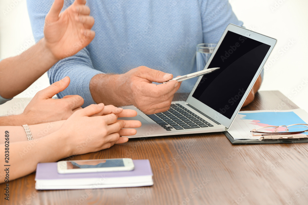 Fototapeta premium Mature manager consulting couple in office