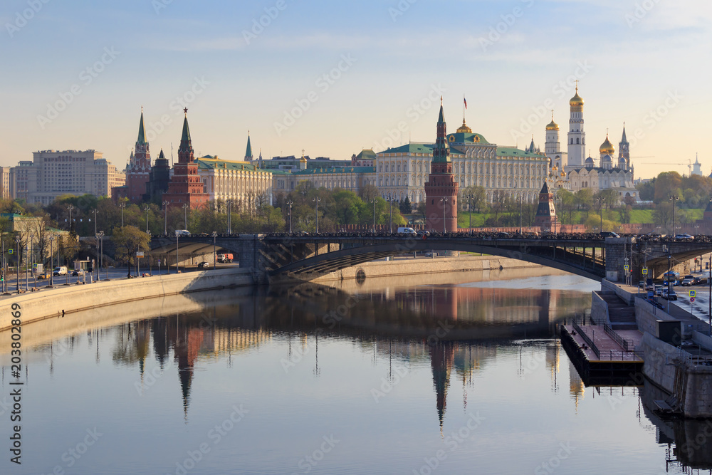 Moscow Kremlin on a Bol'shoy Kamennyy bridge background in sunny spring morning
