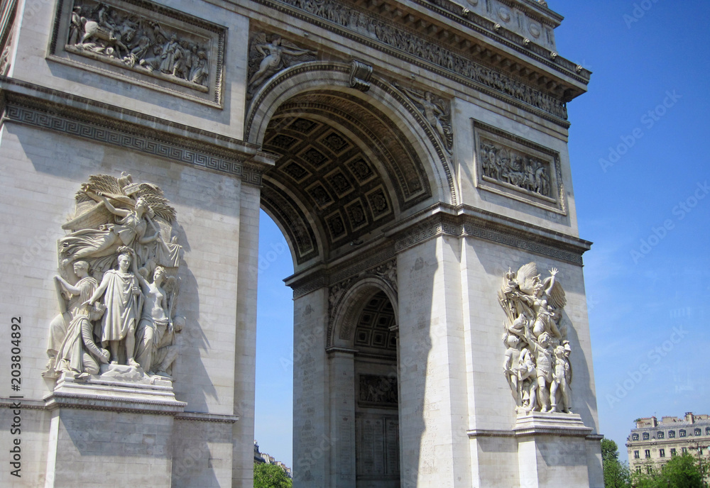 Arc de Triomphe in Paris, France, historical monument, with sky in background. Arch of Triumph, Champs-Elysees.
