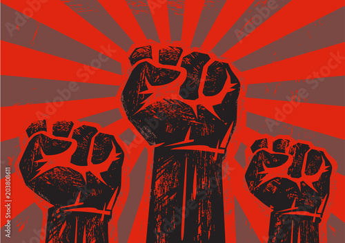 Three clenched raised fists