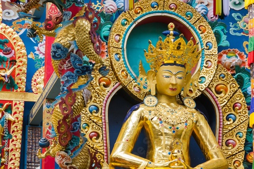 Buddha Amitayus golden statue at Namdroling Monastery in Bylakuppe, Karnataka, India. Tibetan Buddhist religion concept