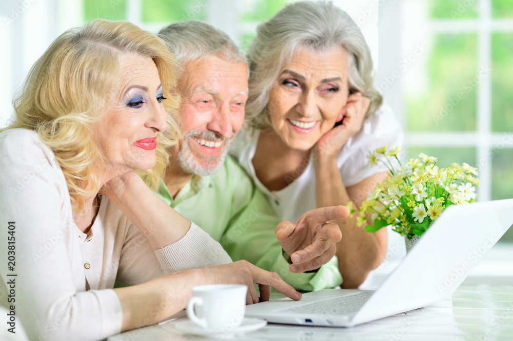 senior people using digital tablet senior people using digital tablet