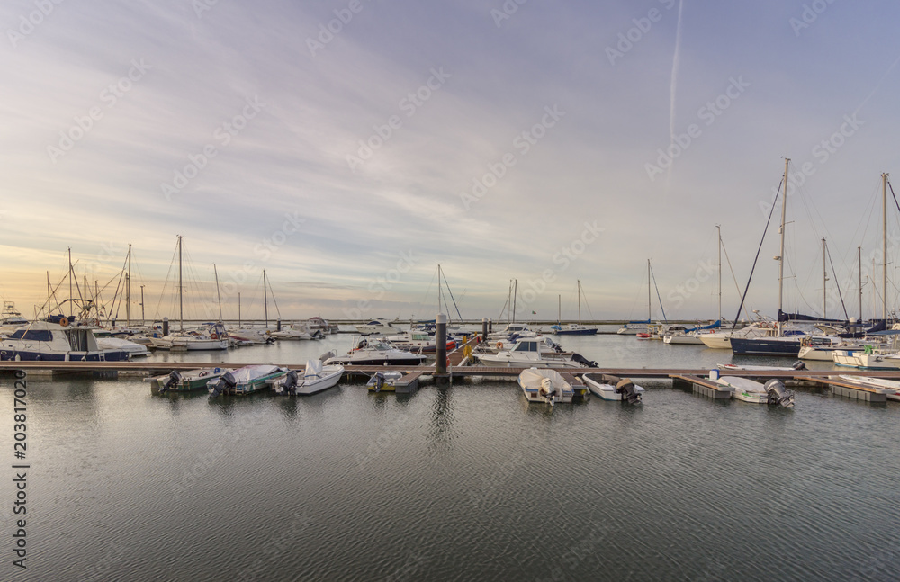 Obraz premium Seascape view of Olhao Marina, waterfront to Ria Formosa natural park. Algarve.