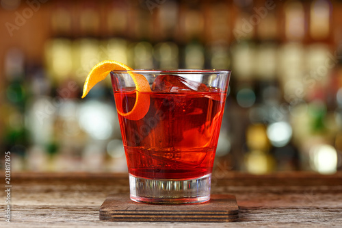 Classic cocktail Negroni with gin, campari and martini rosso photo