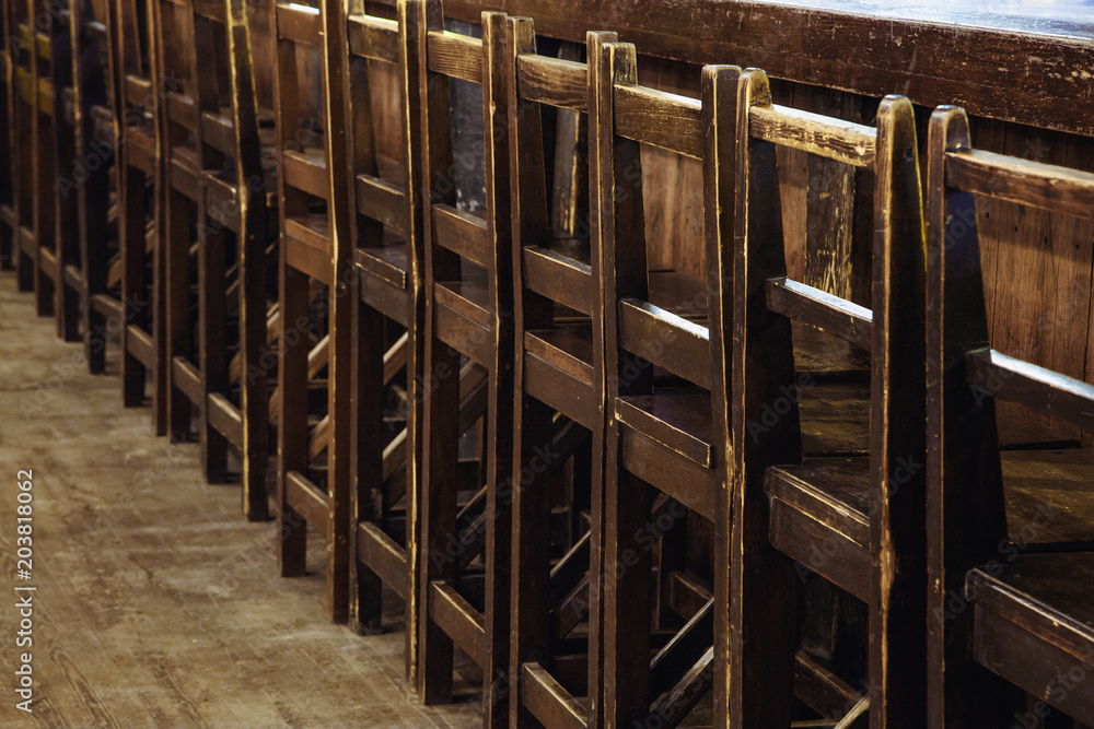 empty chairs in the restaurant stand in a row empty chairs in the restaurant stand in a row