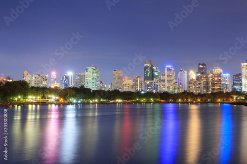 Lake view with reflections of the city   high building in the city lake view