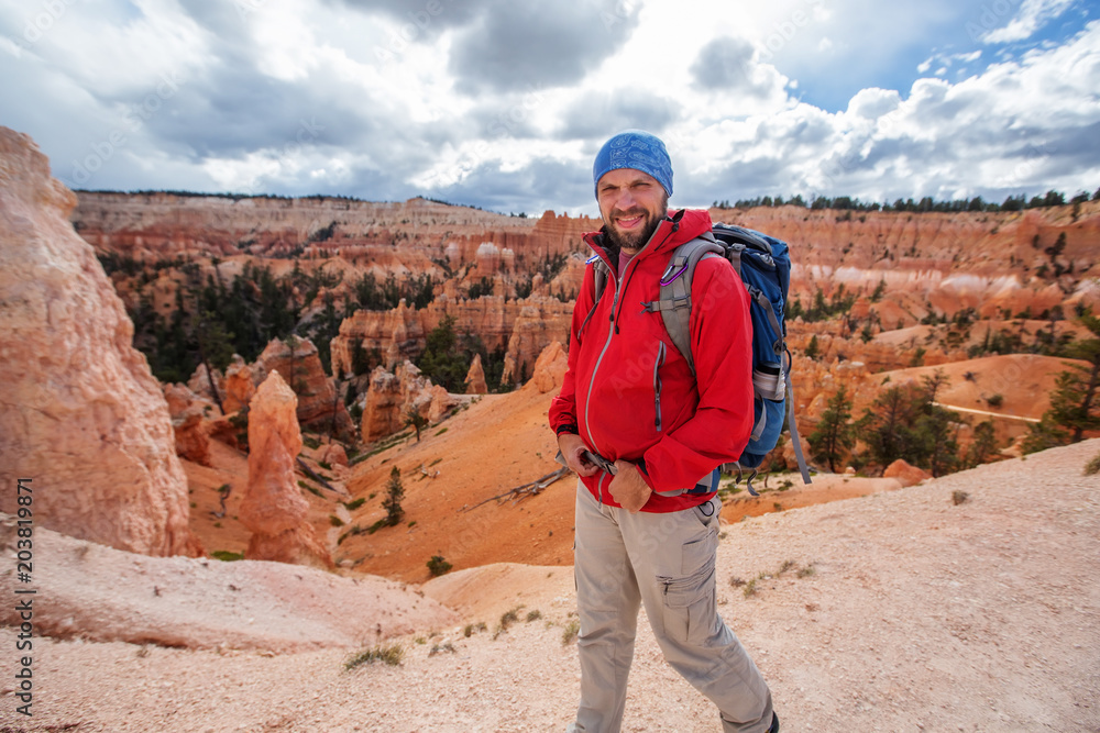 Hiker visits Bryce canyon National park in Utah, USA Hiker visits Bryce canyon National park in Utah, USA