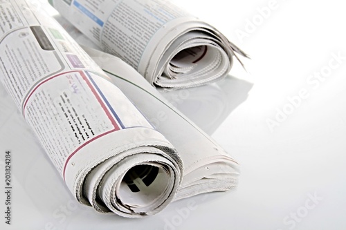 news paper sitting on a table