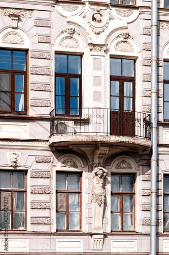 Caryatid. Detail of the facade decoration. St. Petersburg, Russia.