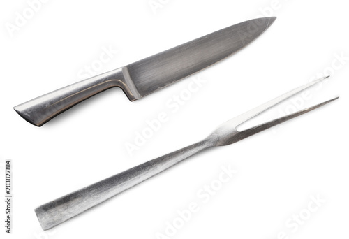 Steak knife and fork isolated on white