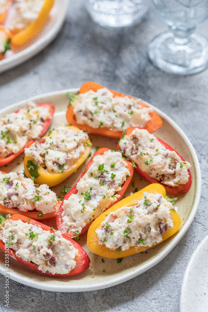peppers stuffed with cheese, bacon and herbs peppers stuffed with cheese, bacon and herbs