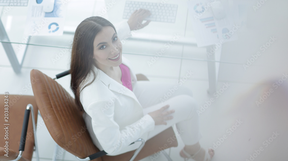 view from the top. photo of a female accountant view from the top. photo of a female accountant