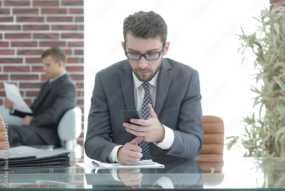 businessman reading text message on smartphone