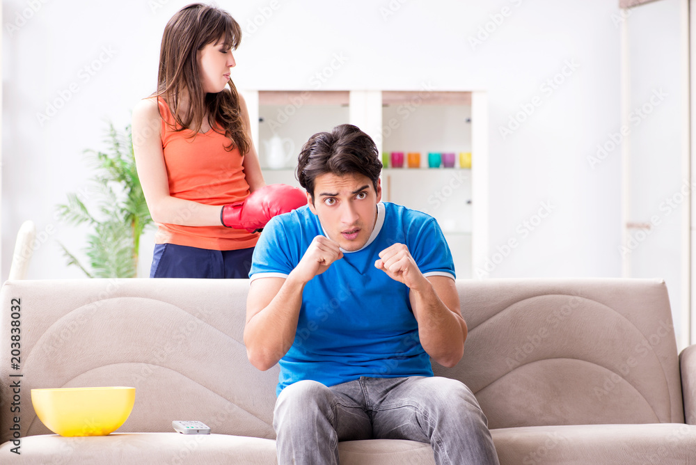 Wife unhappy that husband is watching boxing Wife unhappy that husband is watching boxing