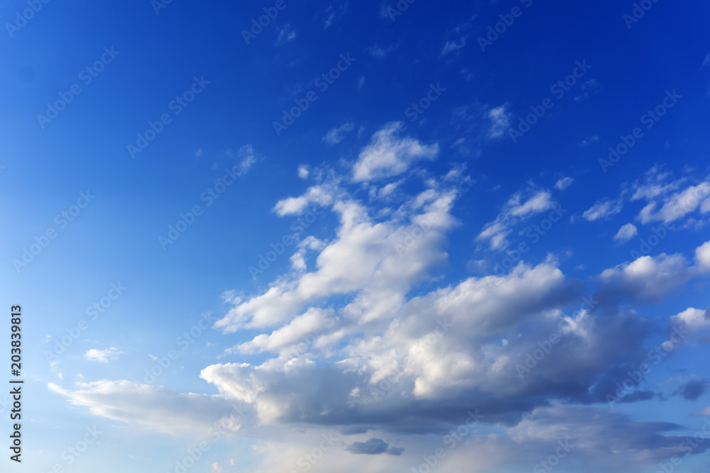background - blue sky with white cumulus clouds