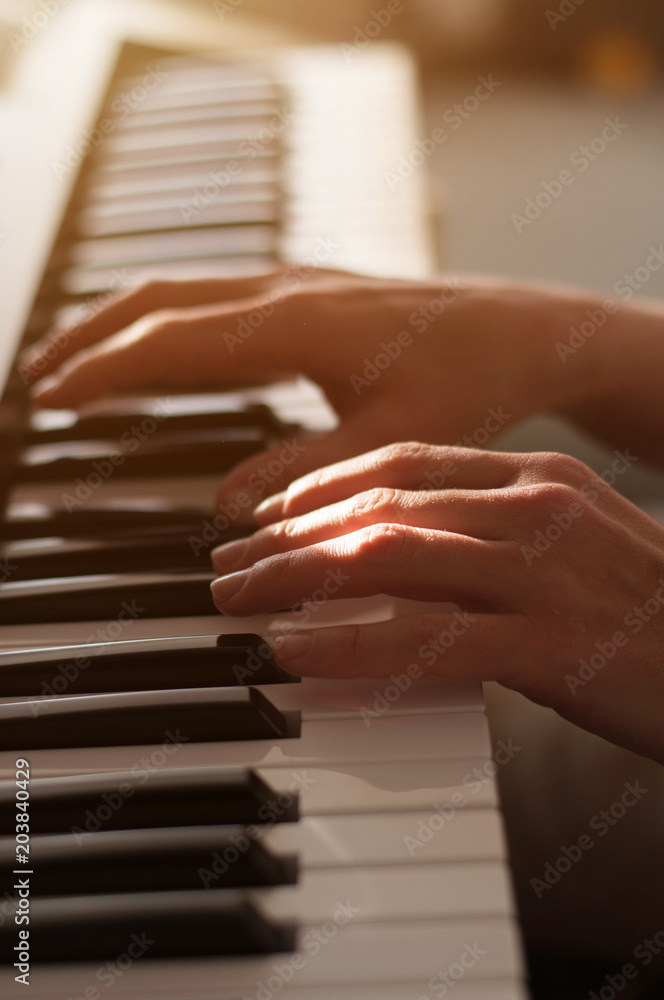 hands on piano