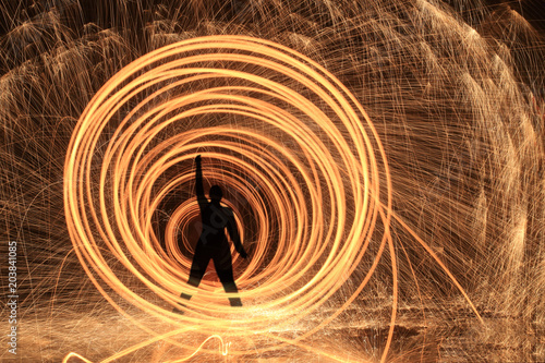 Fototapet Unique Creative Light Painting With Fire and Tube Lighting