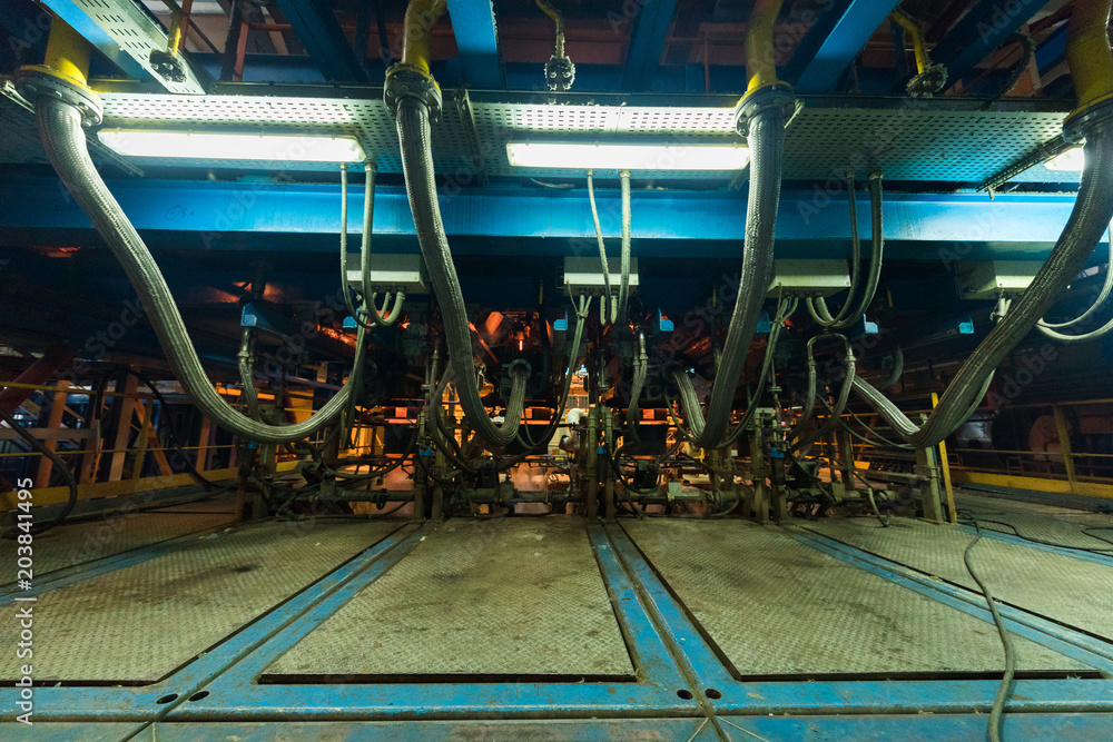 Fototapeta premium Fiberglass production industry equipment at manufacture background