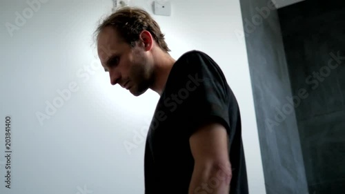 Wallpaper Mural Adult man nervous walking at his room and waiting for guest  Torontodigital.ca