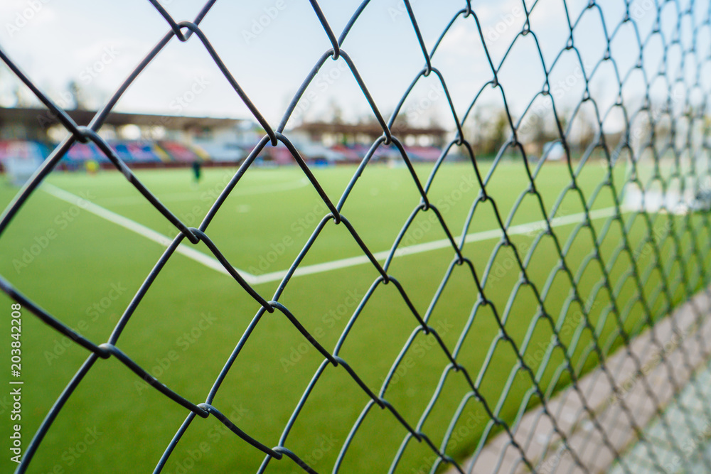 Wire mesh in the stadium. Steel mesh Rabitz Wire mesh in the stadium. Steel mesh Rabitz