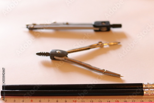 School supplies on the white background. School and education. Colorful accessories: black and white. Preparation for school. School supplies in focus. 