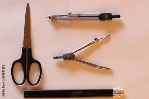 School supplies on the white background. School and education. Colorful accessories: black and white. Preparation for school. School supplies in focus. 