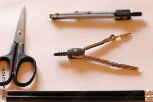 School supplies on the white background. School and education. Colorful accessories: black and white. Preparation for school. School supplies in focus. 