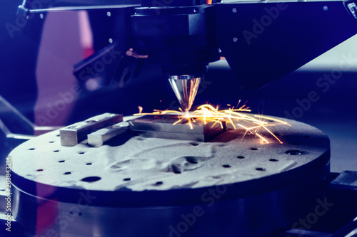 3D metal printer produces a steel part.