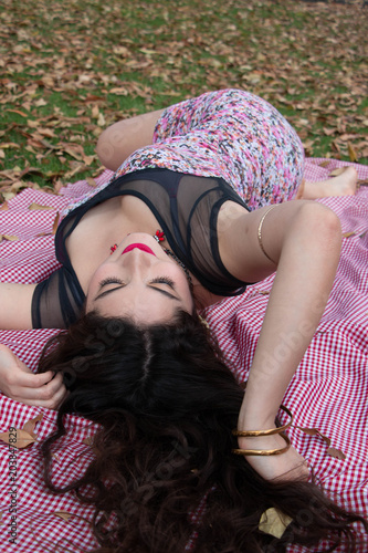 Gorgeous young latina relaxing in the park 