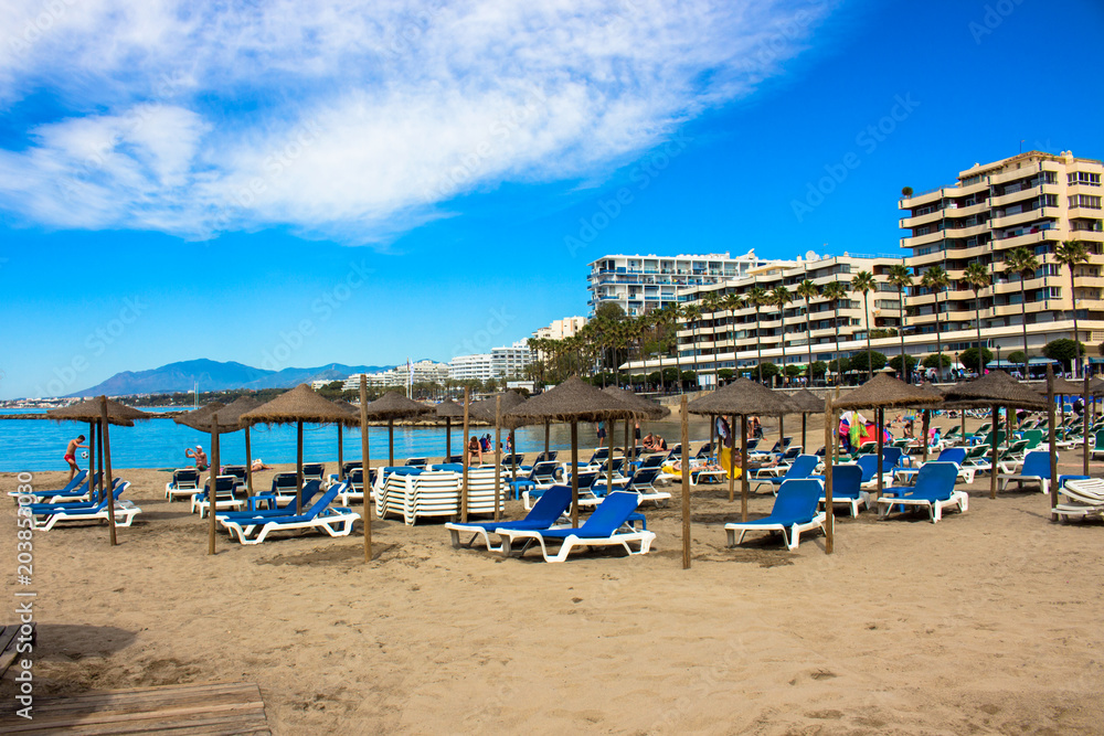 Beach. A sunny day on the beach of Marbella. Malaga province, Andalusia, Spain. Picture taken – 3 may 2018.