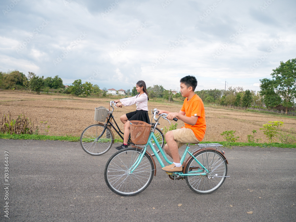 Fototapeta premium Family riding a bike