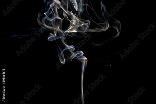 White smoke on black background.