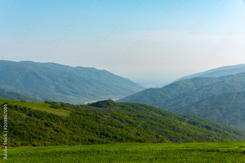 Mountain landscape, green spring mountains, highlands