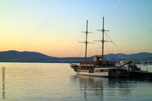 Pirate schooner at the pier in the city © PhotoBetulo