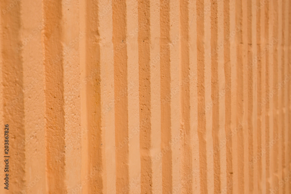 Rough orange wall background. Rough orange wall background.
