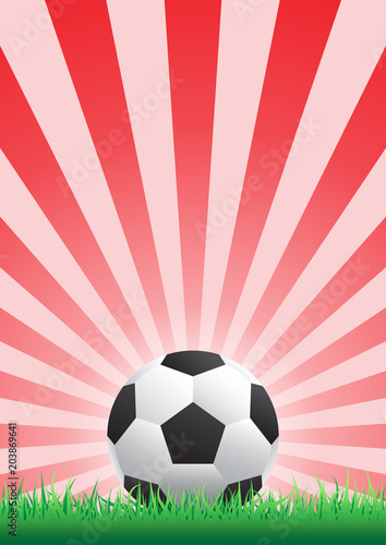 soccer ball on grass with red sunburst background