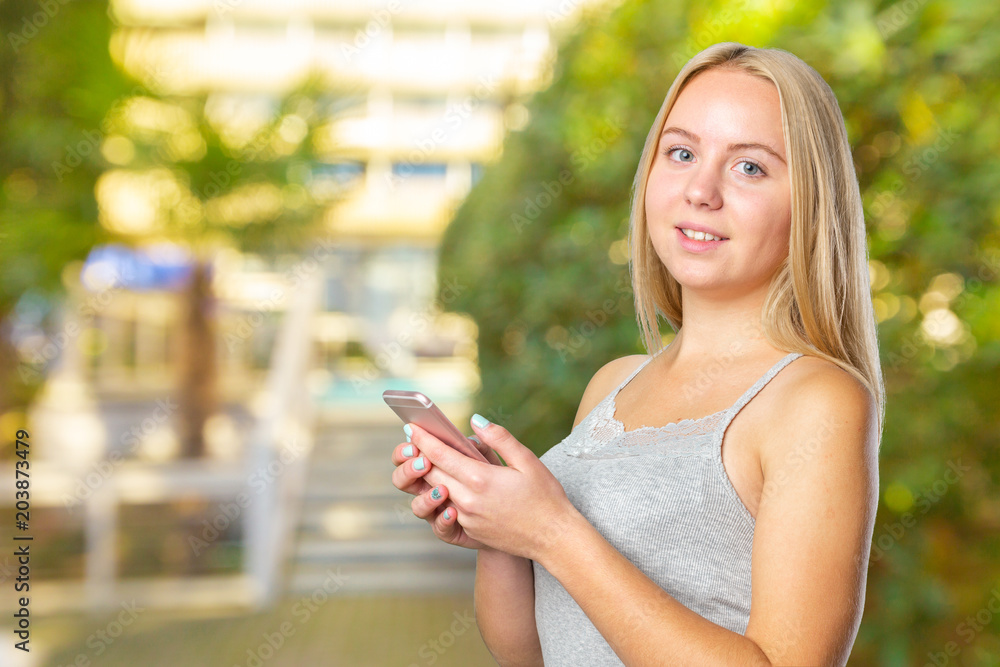 Portrait of Beautiful Young Business woman using mobile phone
