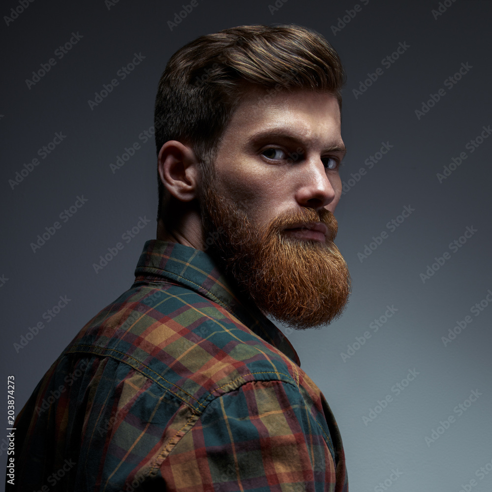 Fashion model with stylish hair. Man with long beard and mustache on  serious face. Hipster in shirt. Barber fashion and beauty. Stock Photo |  Adobe Stock