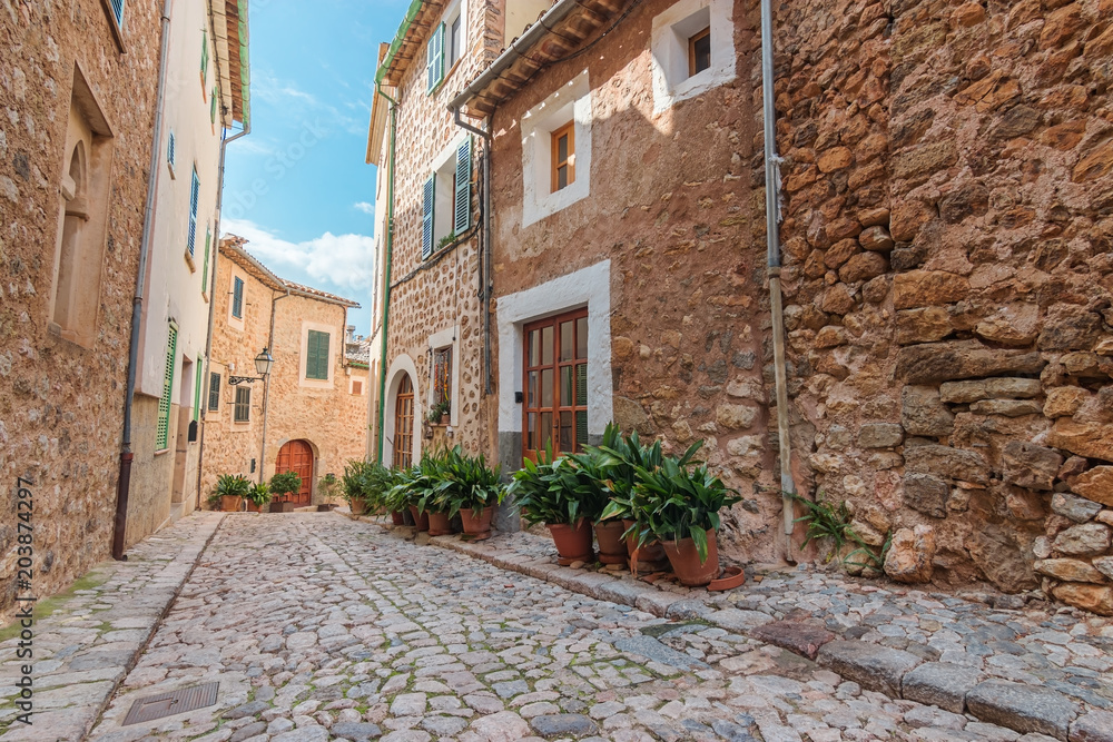 Biniaraix village cobbled street. Soller municipality in Majorca Balearic Islands.