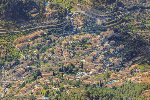 Deia charming town in Serra de Tramuntana mountains. Aerial view scenery. Majorca Balearic Islands. © ddRender